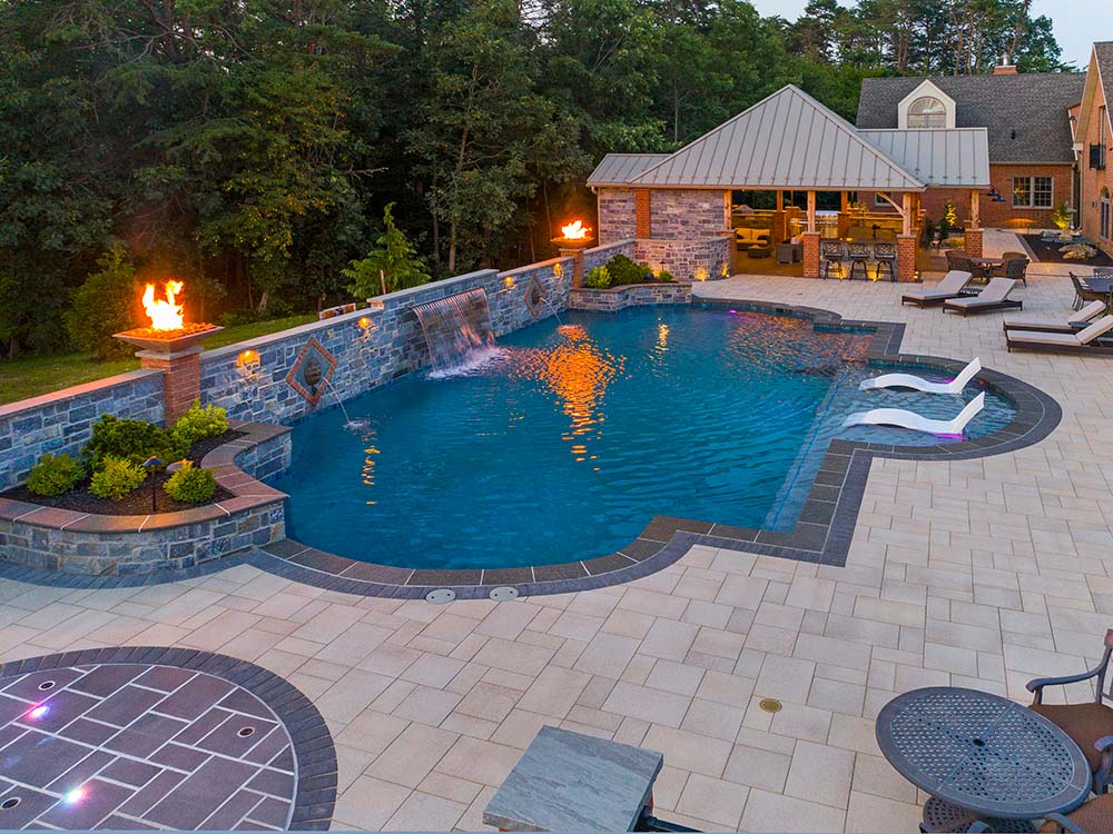 Flaming towers around luxury pool